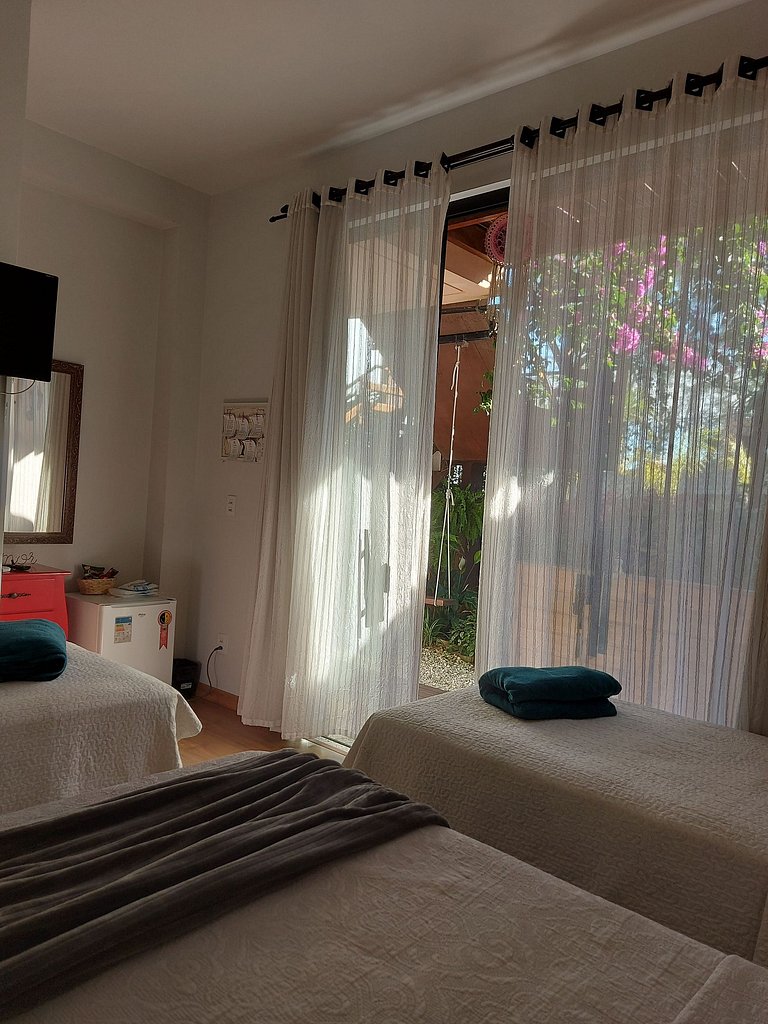 Casa da Flor Guest House - Suíte Abacateiro. Praia Grande