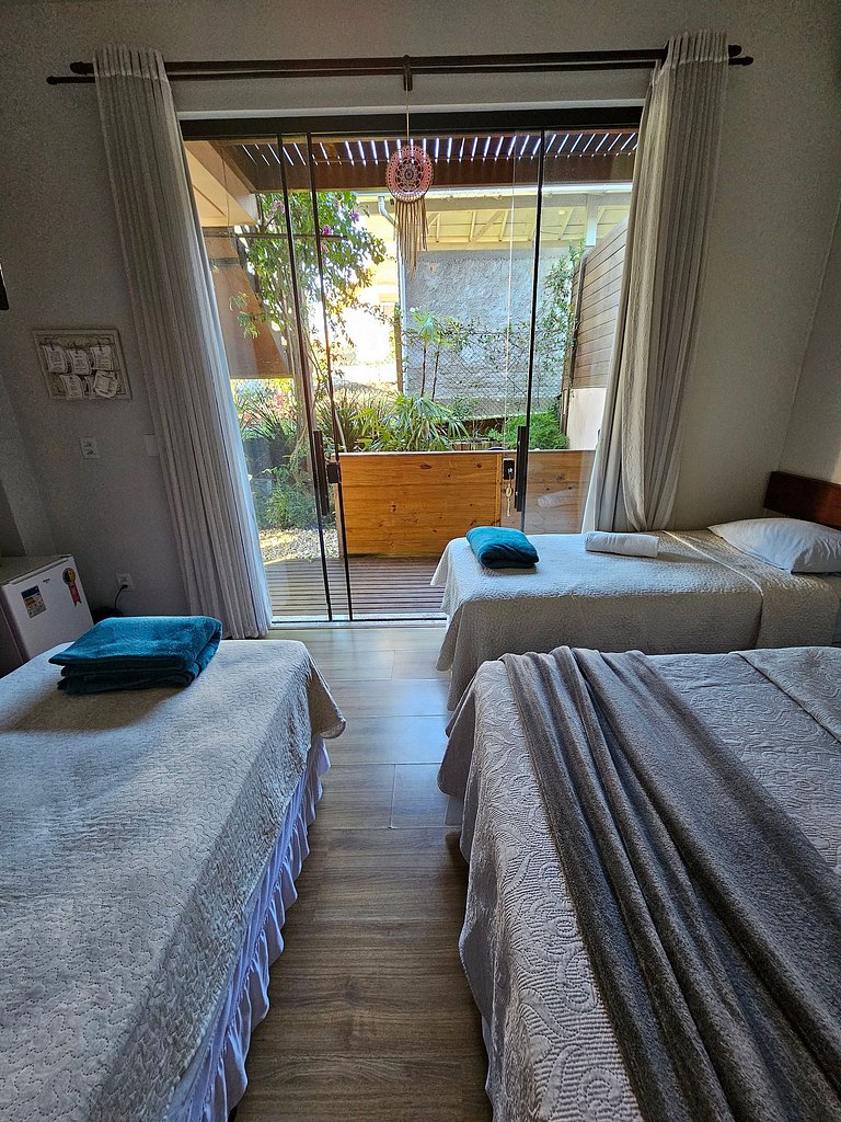 Casa da Flor Guest House - Suíte Abacateiro. Praia Grande